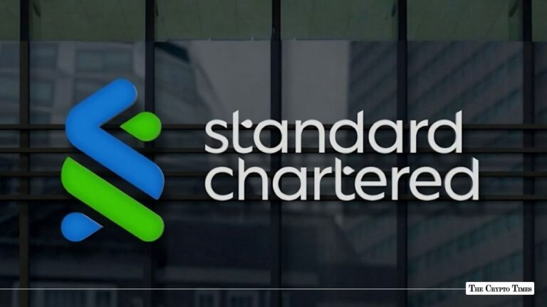 Standard Chartered logo displayed on the glass window facade of an office building