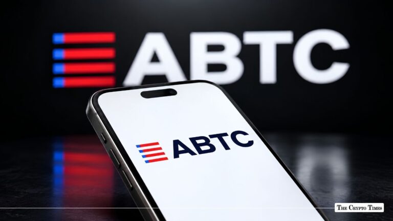 Handheld smartphone displaying the ABTC logo in front of a larger ABTC display banner.