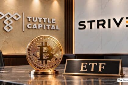 Physical Bitcoin coin and an ETF desk plaque set against Tuttle Capital and Strive brand walls.