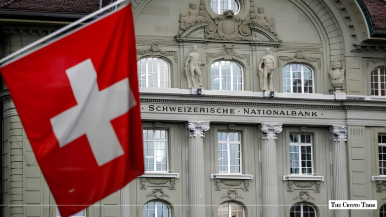 Swiss flag flying in front of the Swiss National Bank (Schweizerische Nationalbank) building