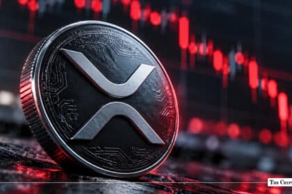 XRP token coin standing upright against a declining red candlestick market chart background