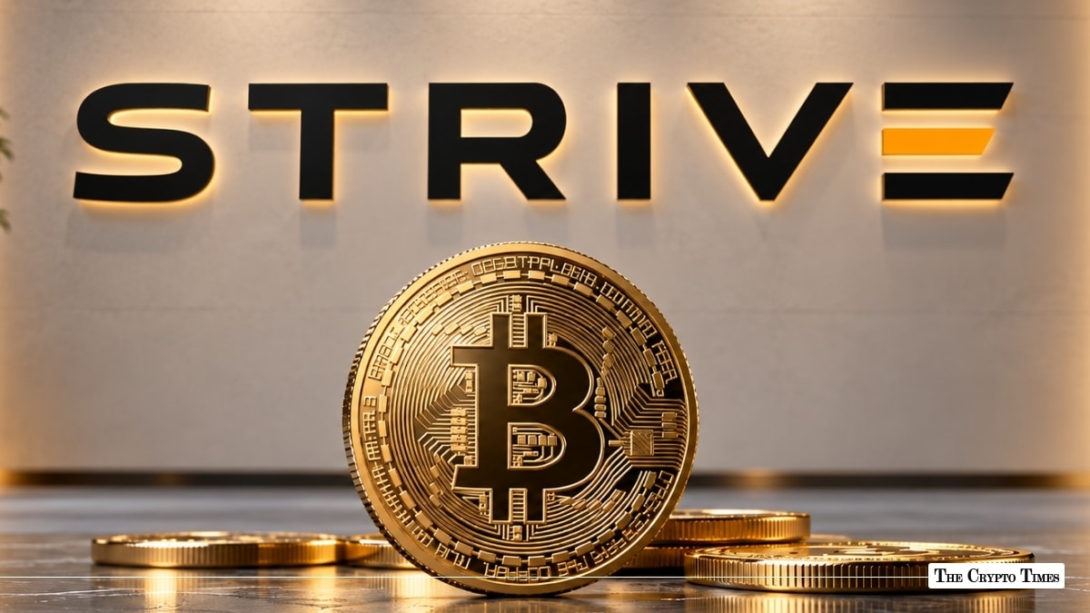 Physical Bitcoin coin in front of illuminated Strive corporate logo