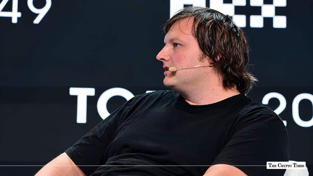 Aave founder Stani Kulechov speaking in profile at an OKX conference.