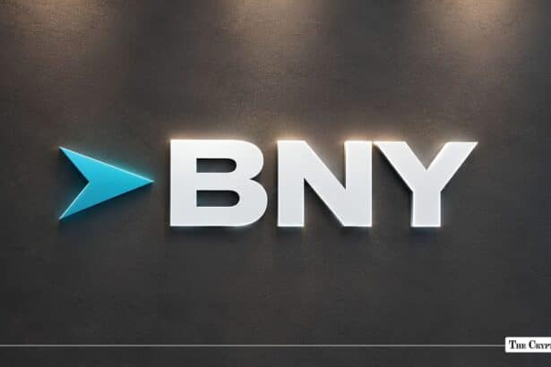 BNY corporate logo and lettering mounted on a dark wall.