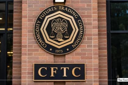 Commodity Futures Trading Commission (CFTC) seal and building plaque mounted on a brick exterior wall.