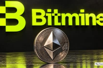 Silver Ethereum ETH coin in front of the Bitmine corporate logo