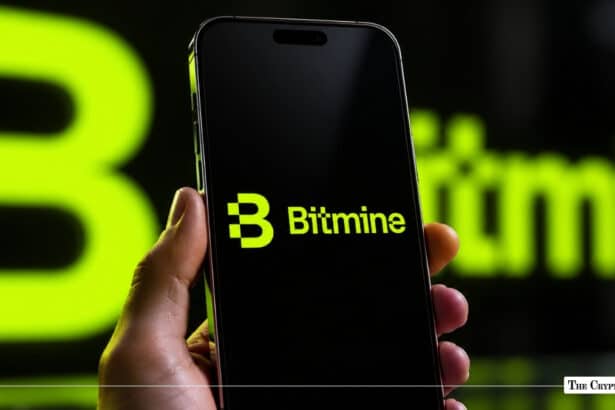 Hand holding a smartphone displaying the Bitmine mobile application logo against a neon green corporate backdrop