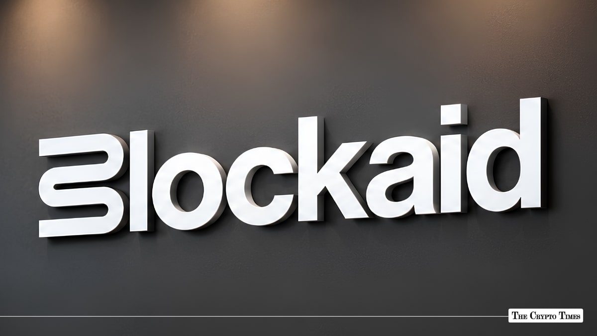 Blockaid company signage with white lettering mounted on a dark grey wall.