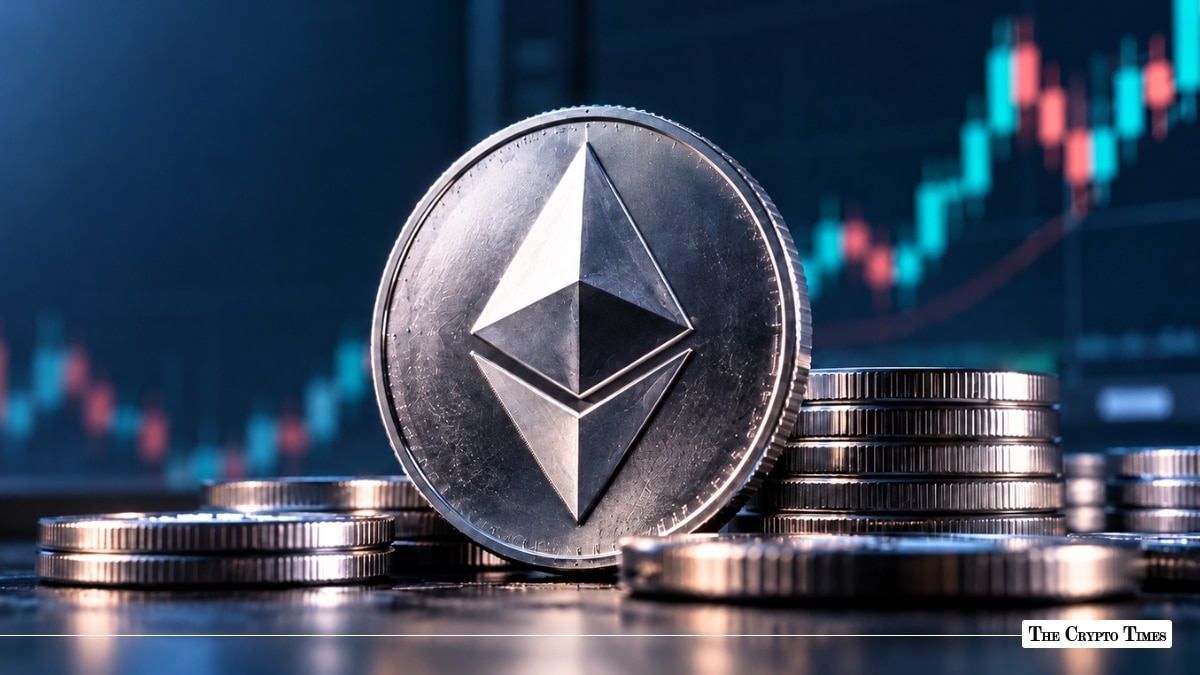 Physical metallic Ethereum (ETH) coin standing among stacks of coins with a financial candlestick trading chart in the background