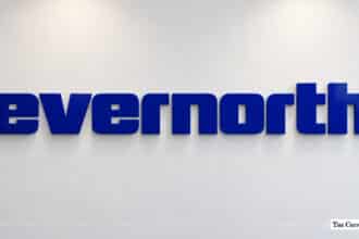 Evernorth corporate logo signage on a white wall