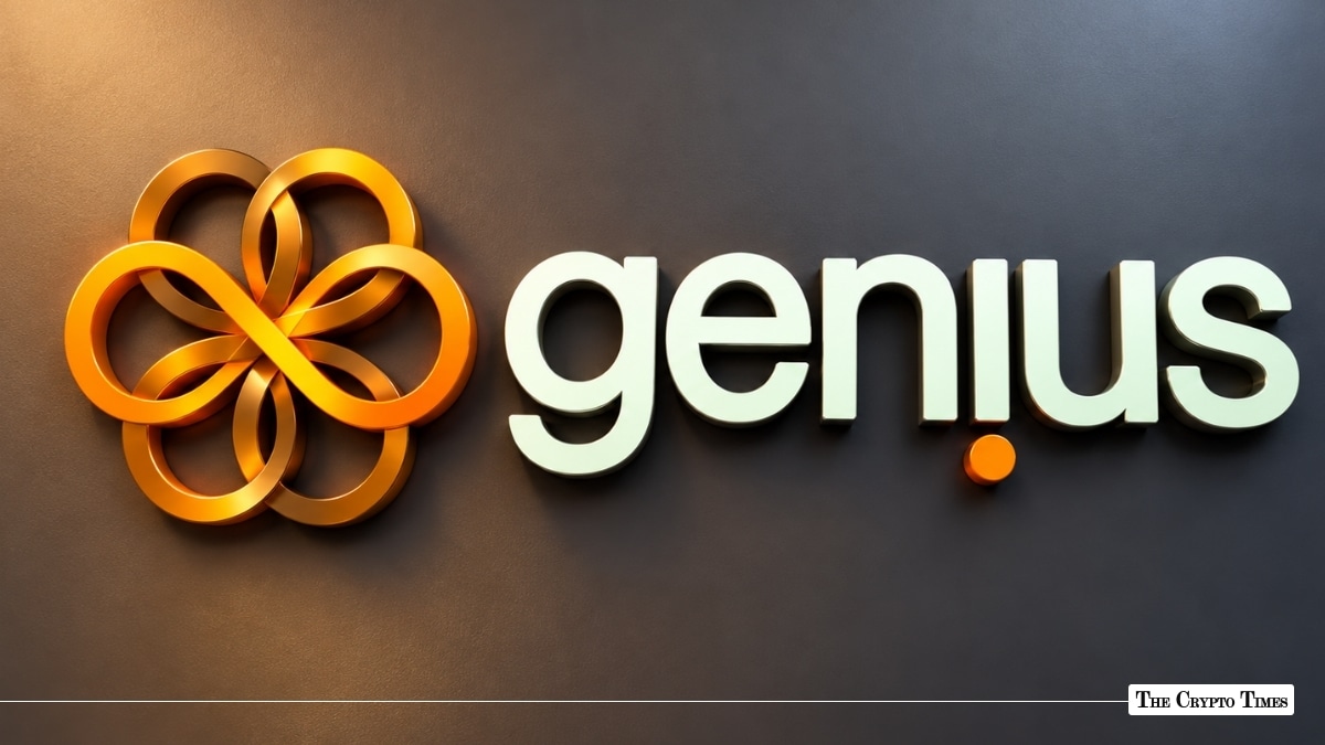 Genius Group corporate logo featuring a golden multi-loop floral emblem alongside lower-case white typography on a dark gray wall