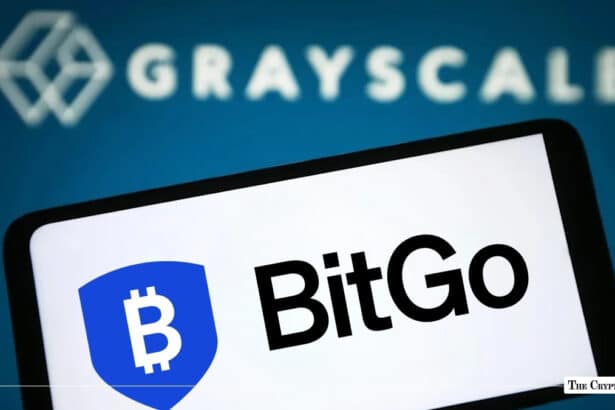 Smartphone showing the BitGo brand logo overlaid on a background featuring the Grayscale Investments corporate name and logo