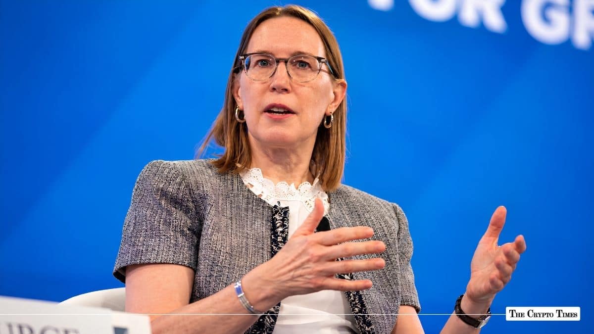 SEC Commissioner Hester Peirce speaking with hand gestures during a conference panel.