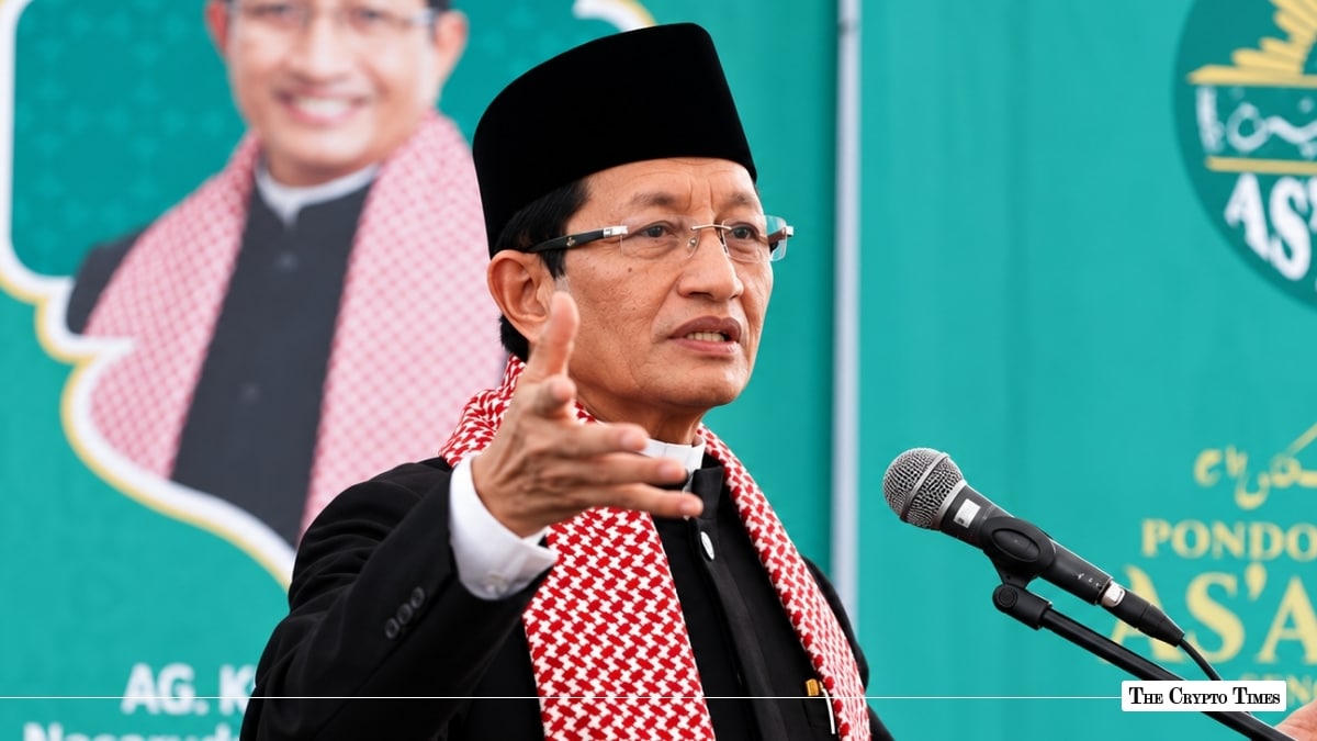 Indonesian Minister of Religious Affairs Nasaruddin Umar speaking at a microphone