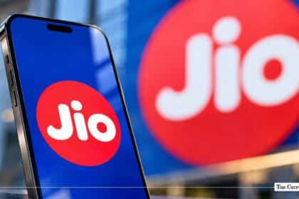 Smartphone screen displaying the Reliance Jio logo in front of Jio corporate branding