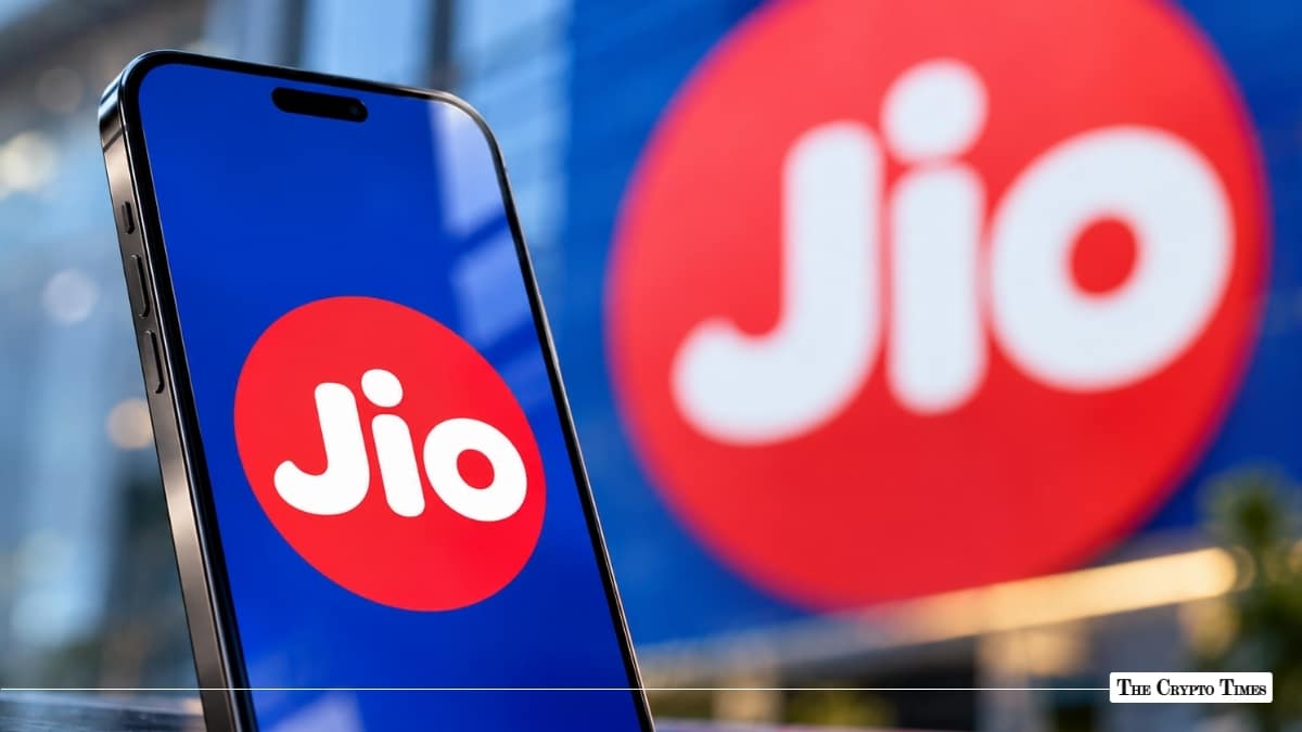 Smartphone screen displaying the Reliance Jio logo in front of Jio corporate branding