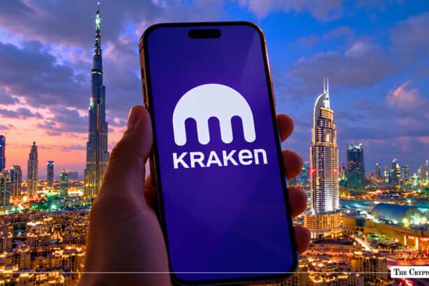 Smartphone showing the Kraken crypto exchange app in front of the Dubai skyline
