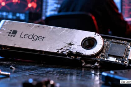 Cracked Ledger hardware crypto wallet with exposed circuit boar