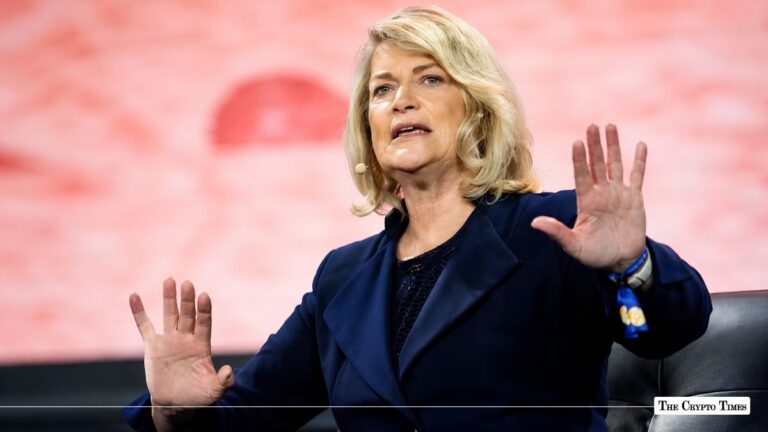 U.S. Senator Cynthia Lummis speaking with raised hands at a conference.