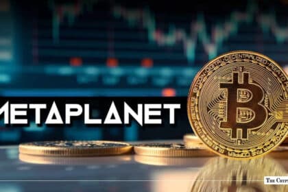 Physical Bitcoin coin beside the Metaplanet logo with a financial chart background