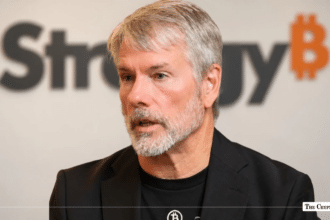 MicroStrategy Executive Chairman Michael Saylor in front of a MicroStrategy Bitcoin logo