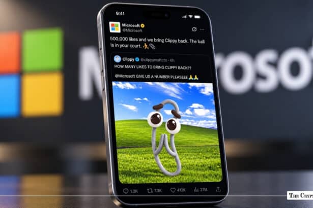 Smartphone displaying a viral X tweet about bringing back Microsoft Clippy in front of a Microsoft logo background