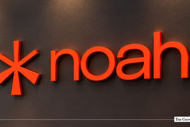 Noah logo mounted on an illuminated corporate wall.
