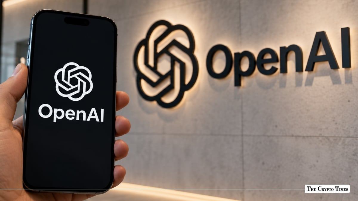 Smartphone displaying the OpenAI logo in front of OpenAI corporate office branding