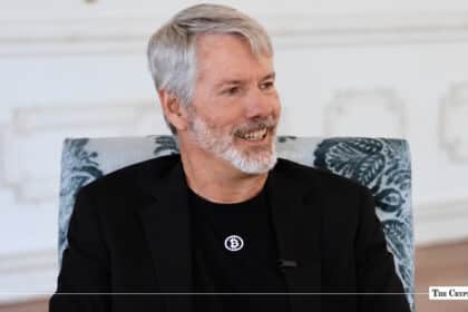 Michael Saylor wearing a Bitcoin t-shirt and smiling during an interview