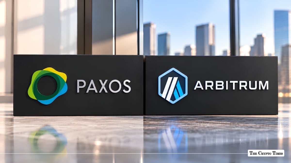 Paxos and Arbitrum logos side-by-side on dark wall panels overlooking a city skyline.