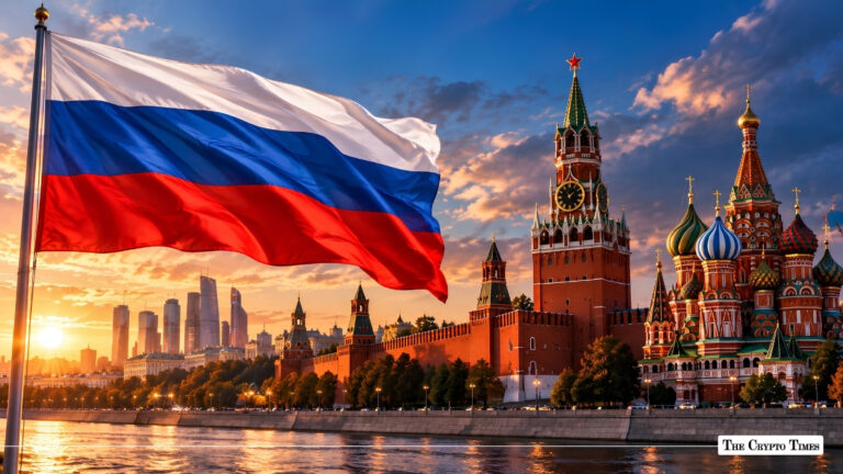 Russian flag waving over the Moscow Kremlin and St. Basil's Cathedral at sunset.
