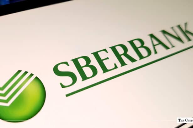 Green Sberbank logo and wordmark displayed on a white digital screen