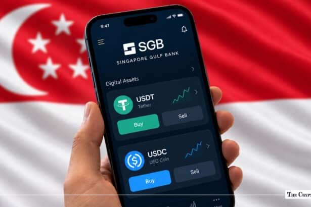 Hand holding a smartphone showing the Singapore Gulf Bank digital asset app against a Singapore flag