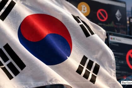 South Korea flag in front of crypto trading screens with prohibition icons
