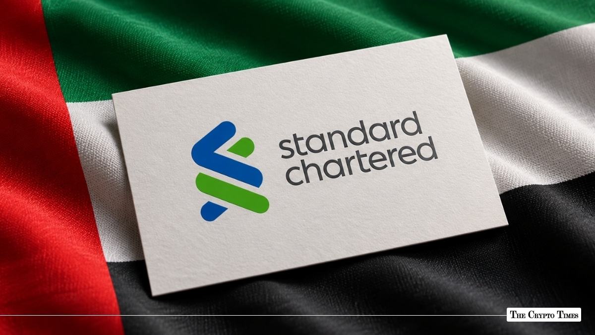 Standard Chartered logo card placed on a UAE flag