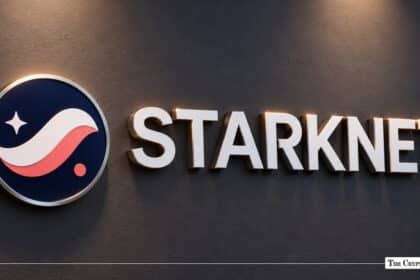Starknet logo mounted on a dark wa