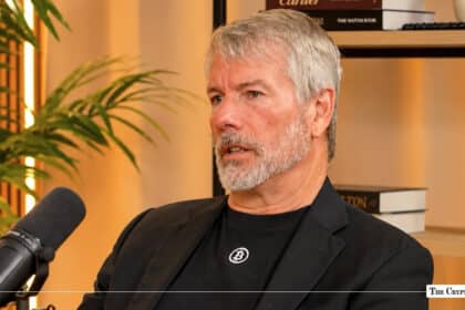 MicroStrategy's Michael Saylor wearing a Bitcoin shirt during a microphone interview