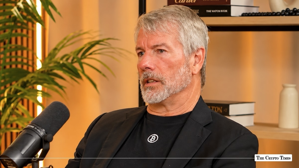 MicroStrategy's Michael Saylor wearing a Bitcoin shirt during a microphone interview