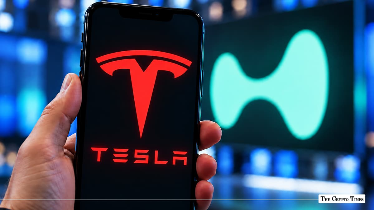 Smartphone screen displaying the red Tesla corporate logo