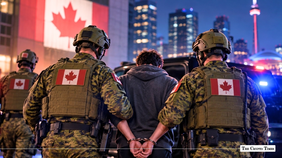 Canadian law enforcement officers arresting a handcuffed suspect in Toronto