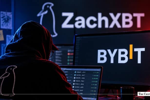 Hooded hacker figure in a dark room monitoring on-chain data for ZachXBT's investigation into the Bybit exploit