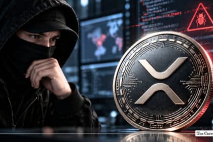 XRP token coin next to a hooded hacker and cyber threat security alert